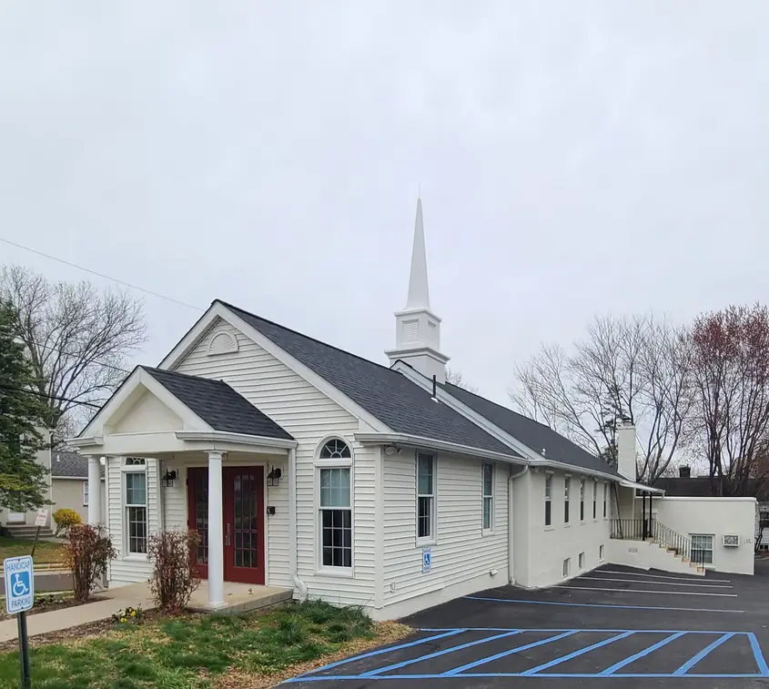 Ardsley Bible Chapel in Ardsley, PA after Aronson Roofing and Siding completed the new roof and reinstalled the steeple
