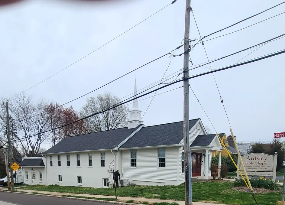 Ardsley Bible Chapel signage, confirming the finished reroof and steeple reinstallation